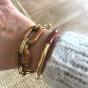 Wrist with camel and gold Milë Mila bracelets in stainless steel
